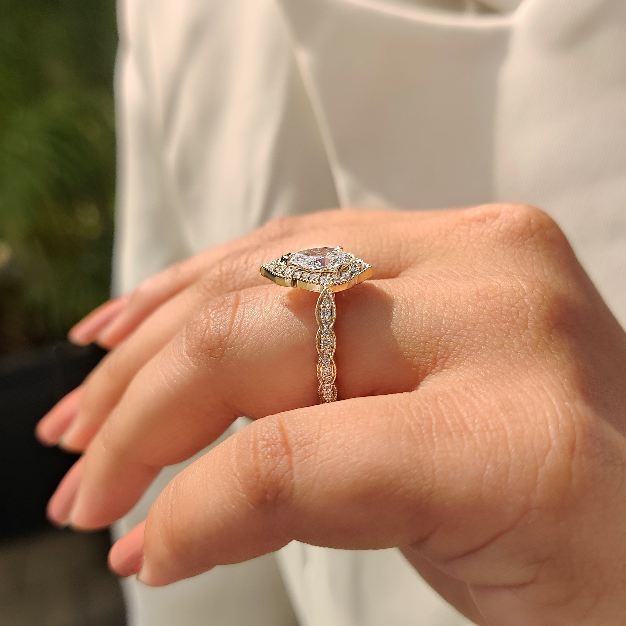 Pear Cut Vintage Diamond Engagement Ring in Halo Setting