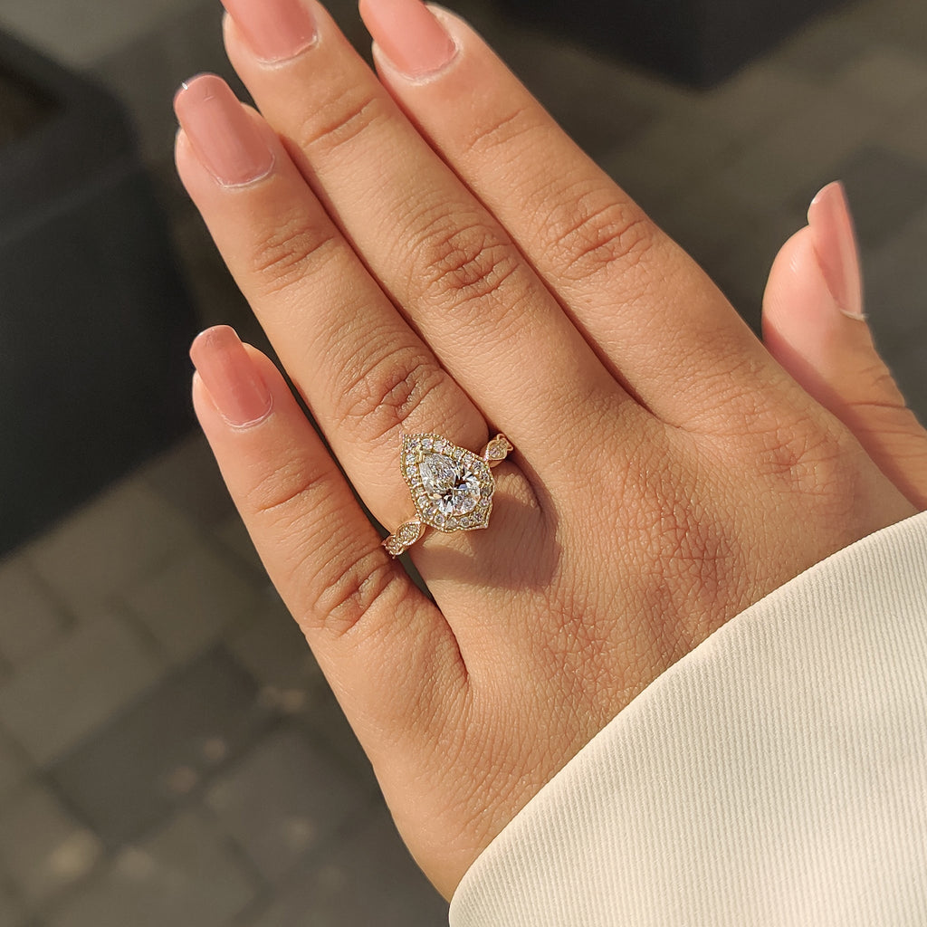 Pear Cut Vintage Diamond Engagement Ring in Halo Setting