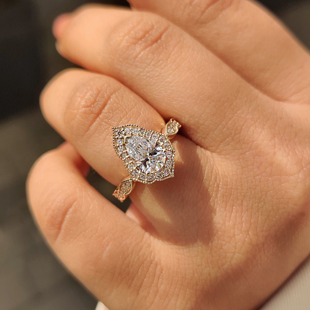 Pear Cut Vintage Diamond Engagement Ring in Halo Setting