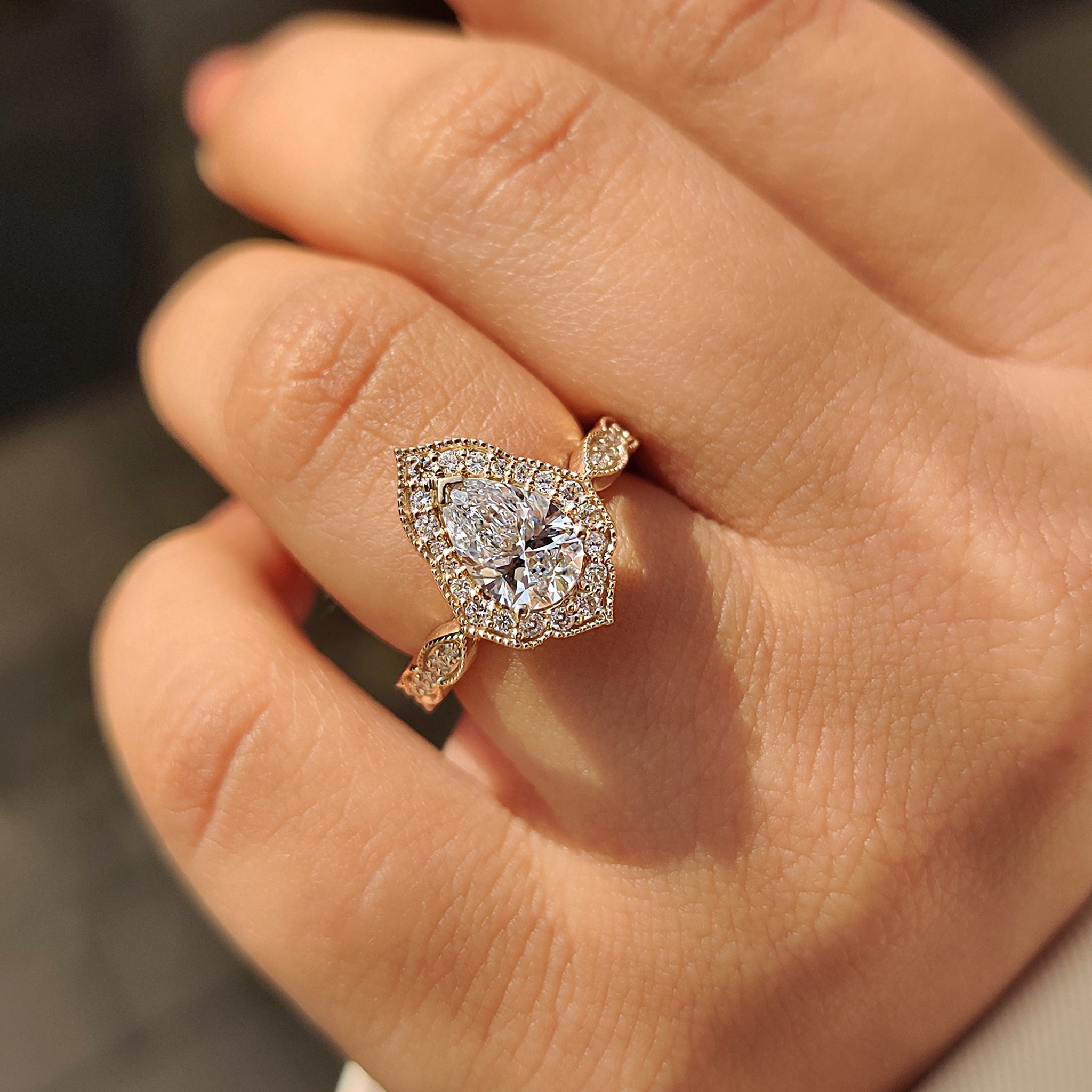 Pear Cut Vintage Diamond Engagement Ring in Halo Setting