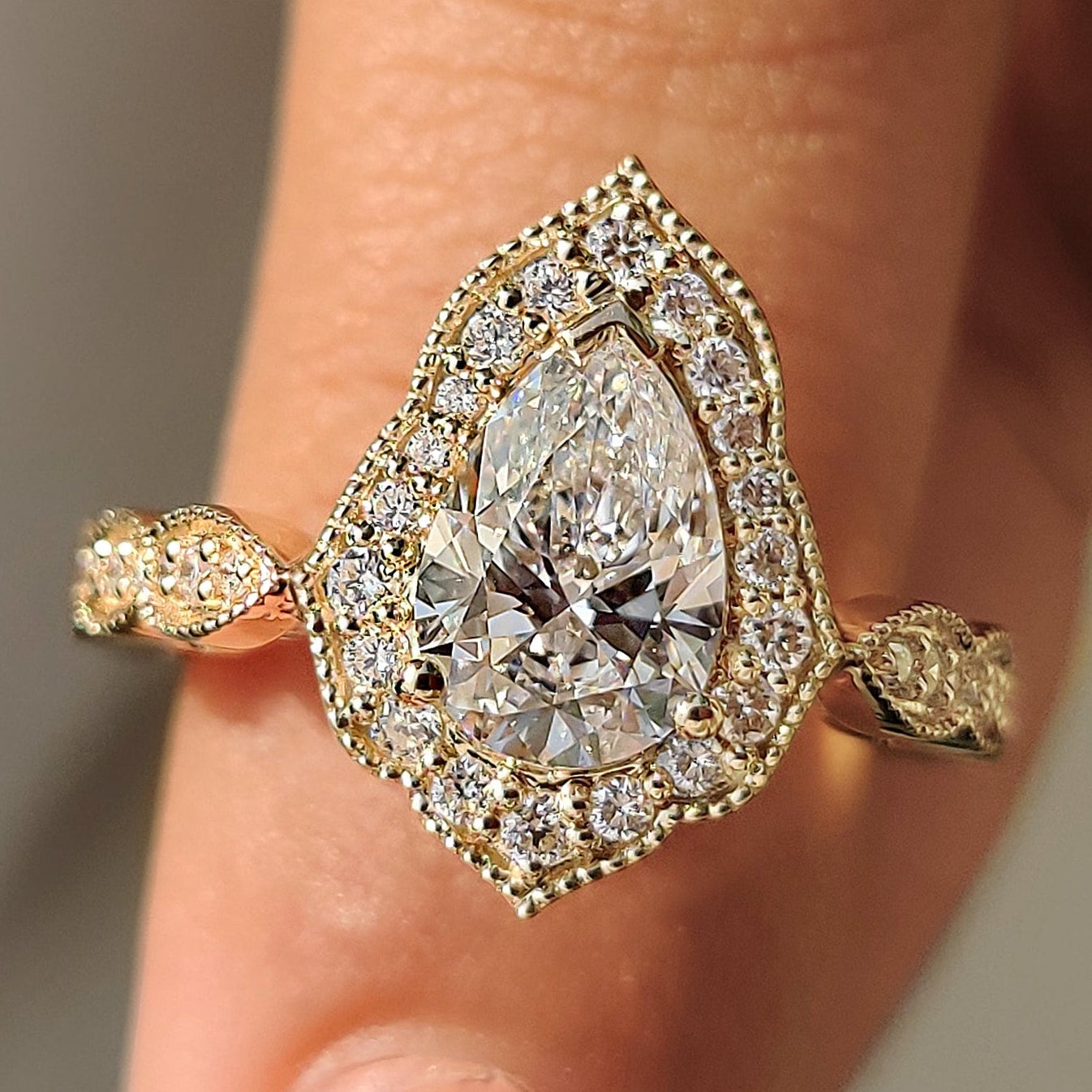 Pear Cut Vintage Diamond Engagement Ring in Halo Setting
