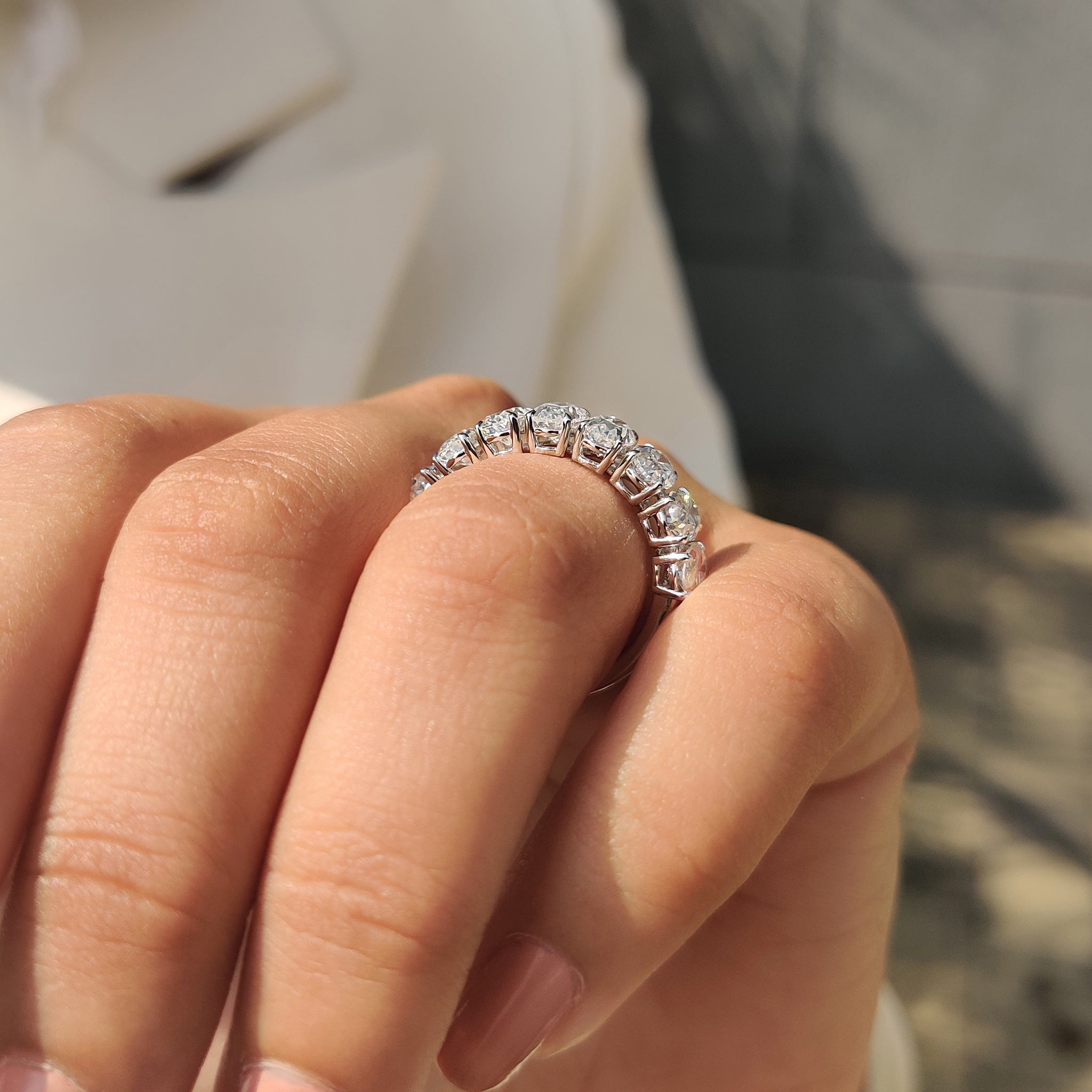 Oval Moissanite Wedding Band In Half Eternity Design