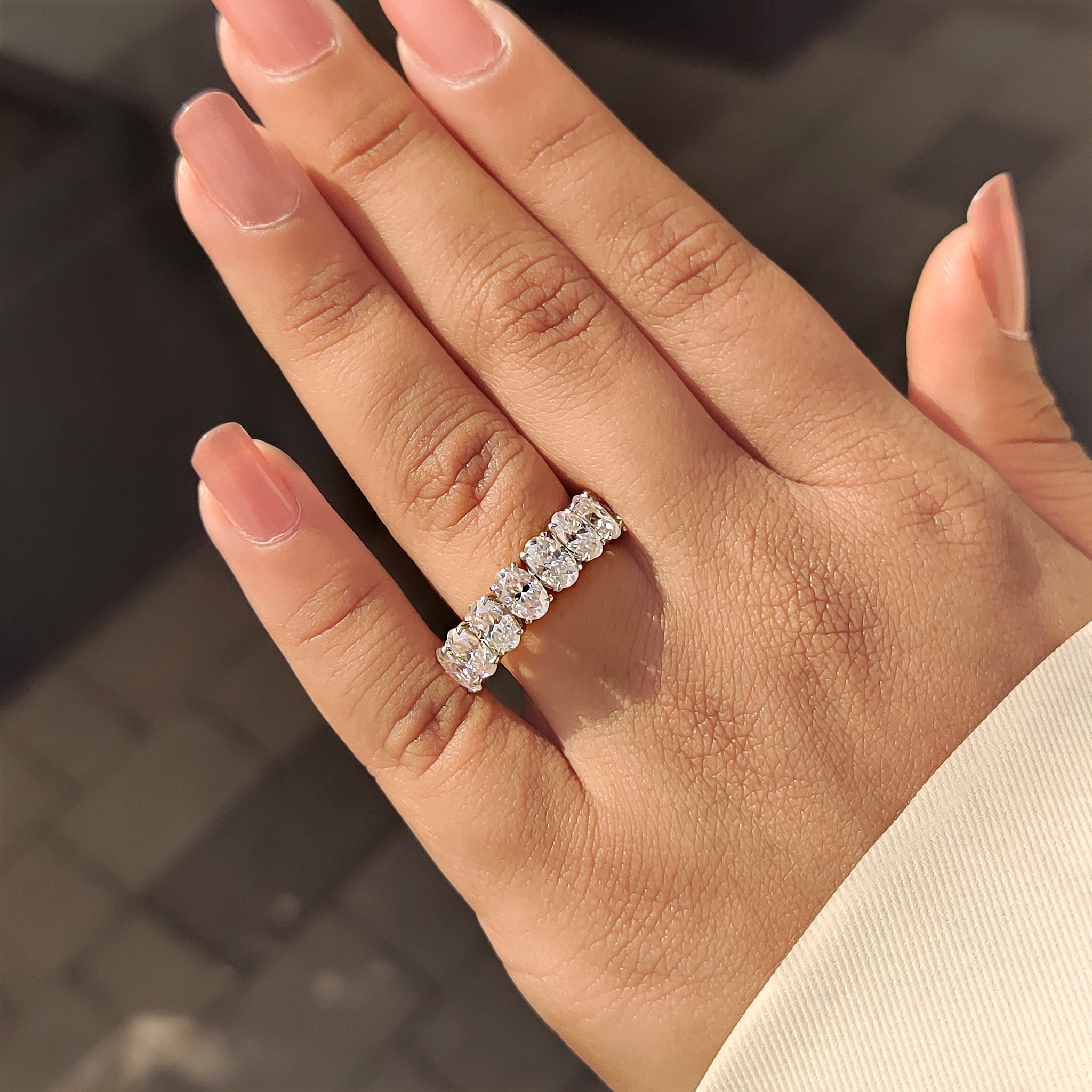 Oval Moissanite Wedding Band In Half Eternity Design