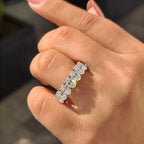 Oval Moissanite Wedding Band In Half Eternity Design