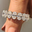 Oval Moissanite Wedding Band In Half Eternity Design