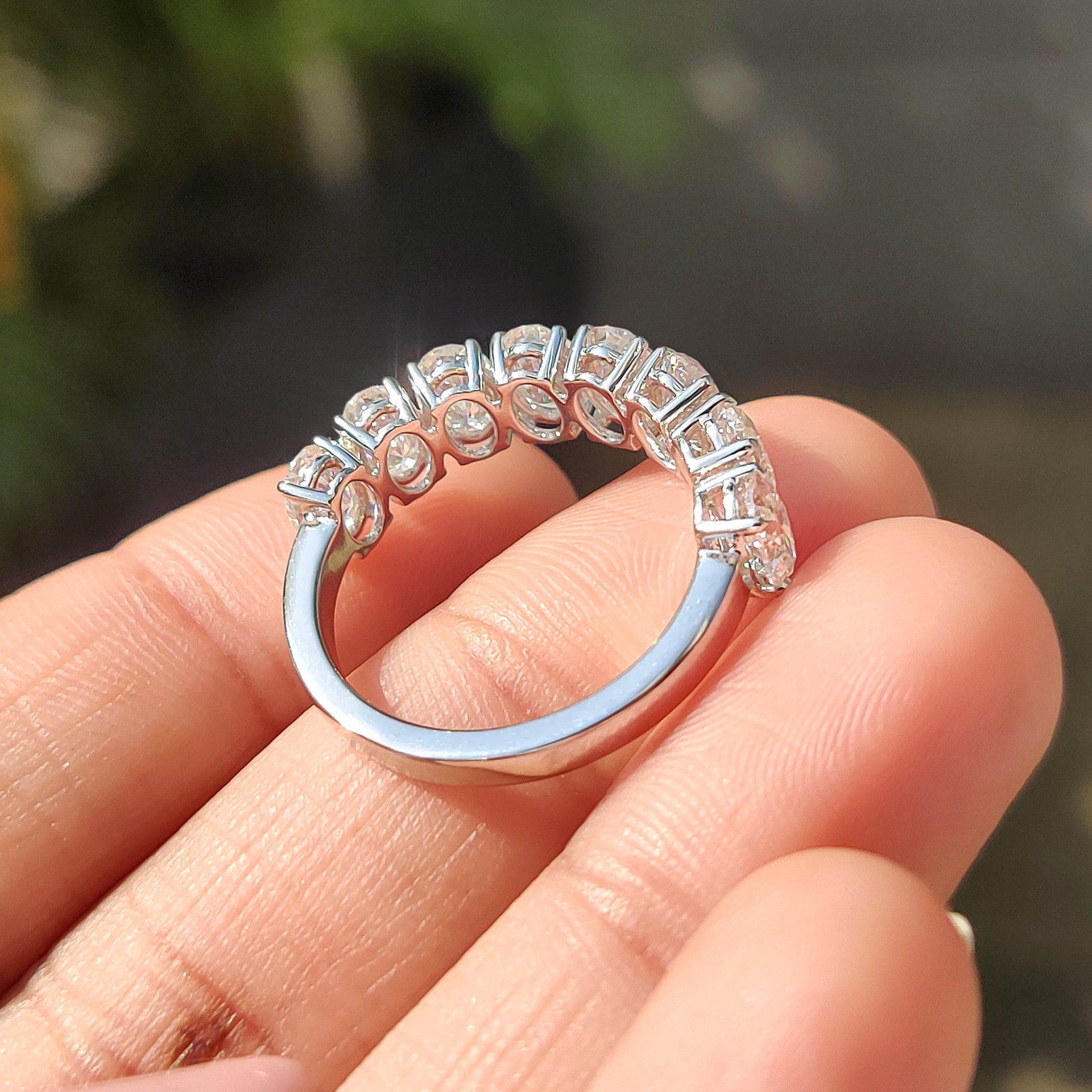 Oval Moissanite Wedding Band In Half Eternity Design