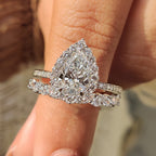 Pear Shaped Diamond Bridal Set With Round Halo Style