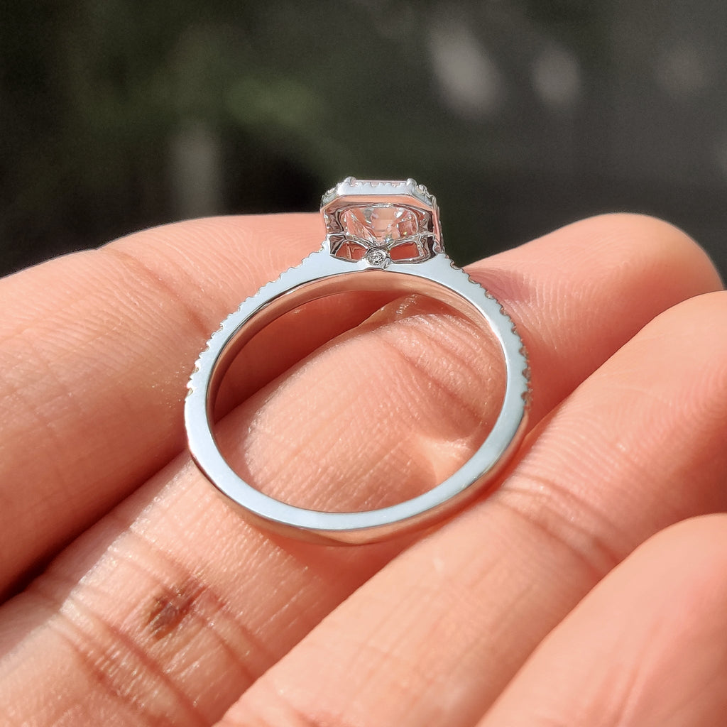 Emerald Halo Engagement Ring with Peekaboo Diamond