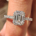 Emerald Halo Engagement Ring with Peekaboo Diamond