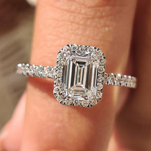 Emerald Halo Engagement Ring with Peekaboo Diamond