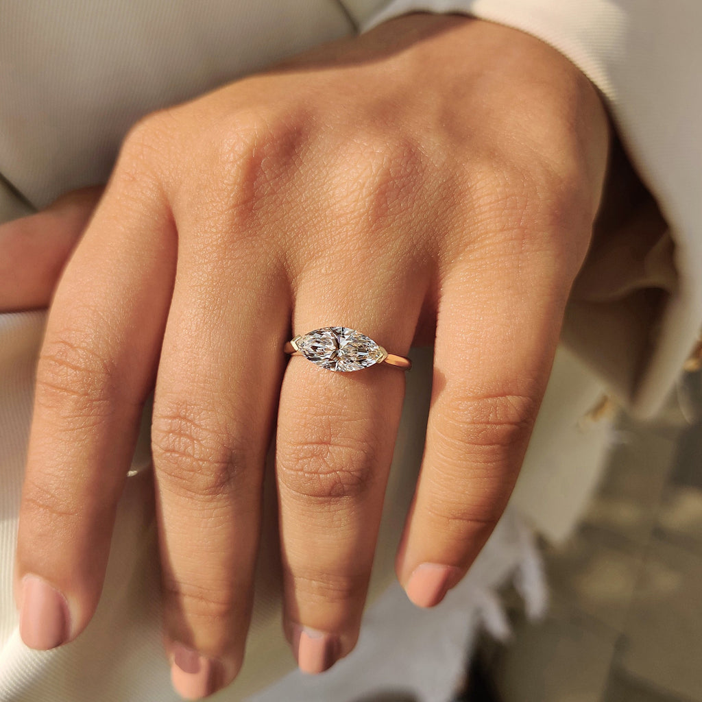 East To West Marquise Ring In Solitaire Style
