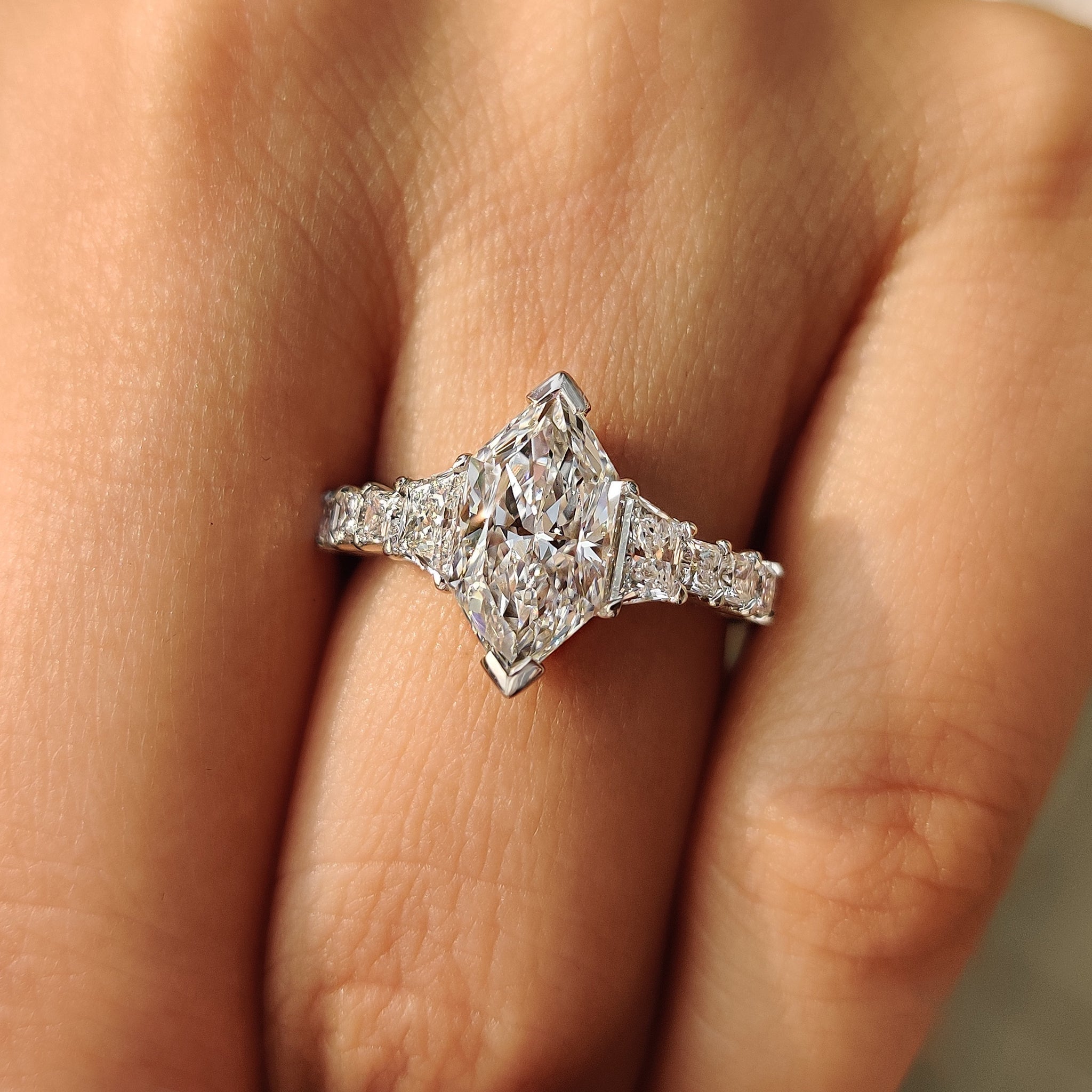 Dutch Marquise Ring With Trapezoid and Princess Side Stone