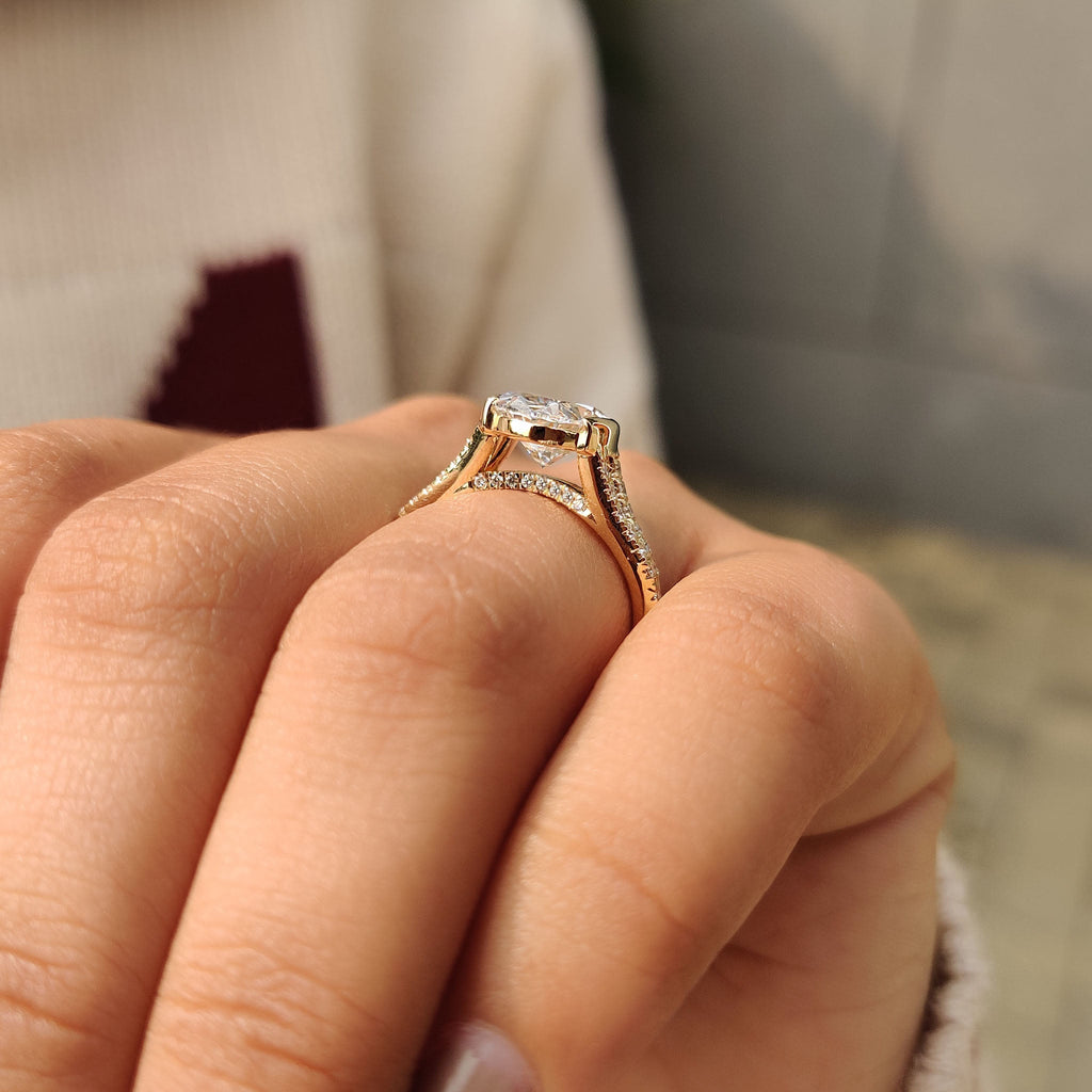 Oval Shaped Diamond Ring With Split Shank Band