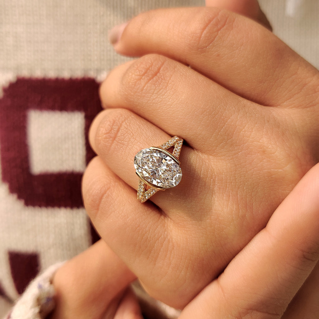 Oval Shaped Diamond Ring With Split Shank Band