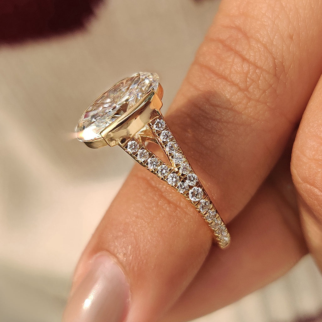 Oval Shaped Diamond Ring With Split Shank Band