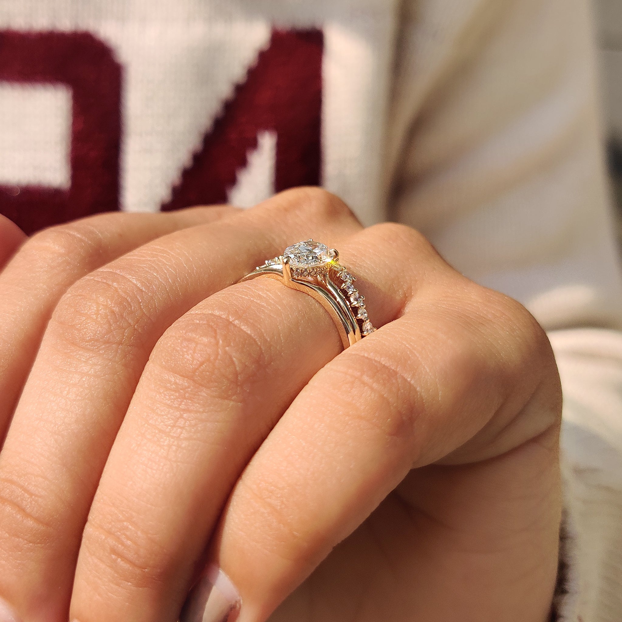 Hidden Halo Pear Shaped Ring with Curved Band