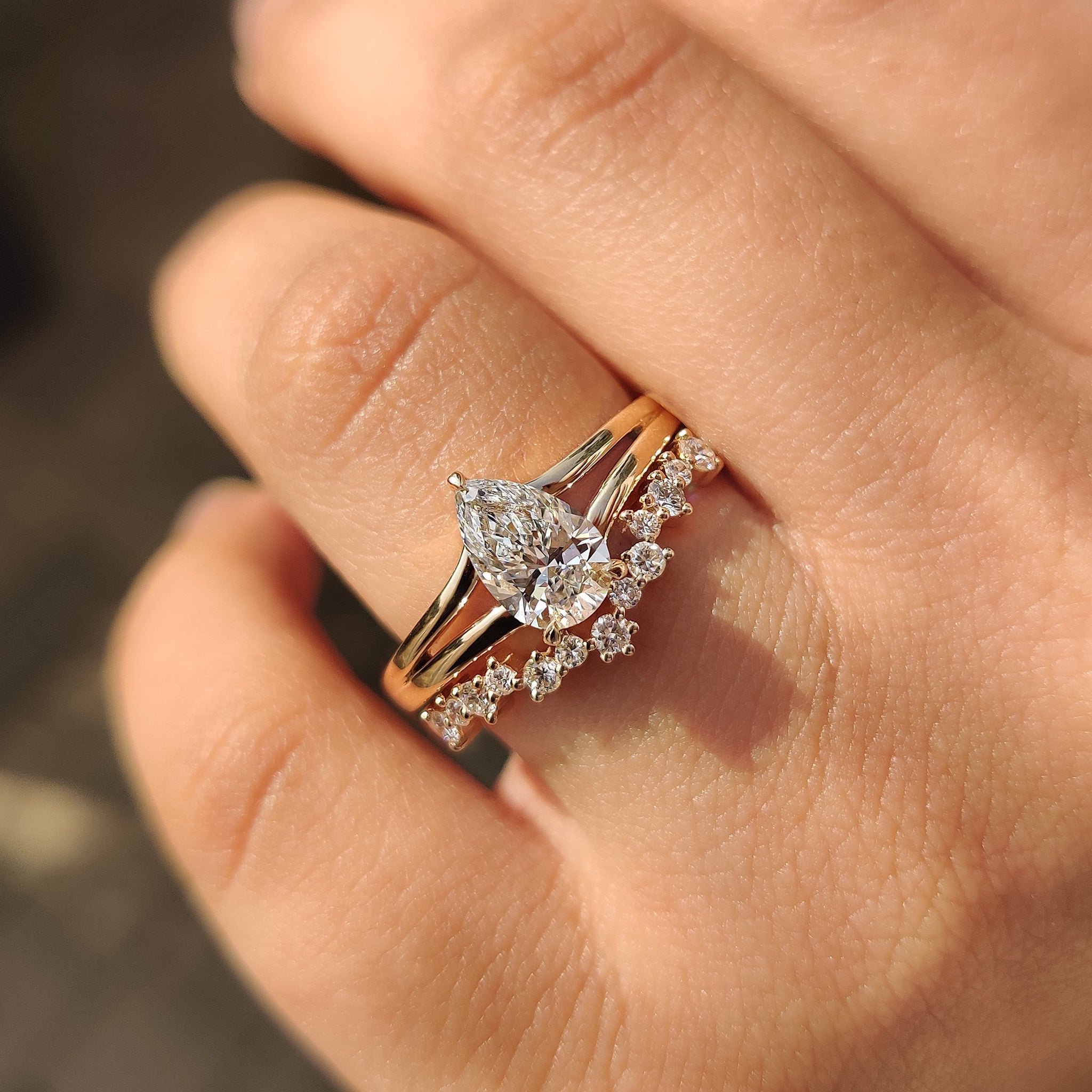 Hidden Halo Pear Shaped Ring with Curved Band