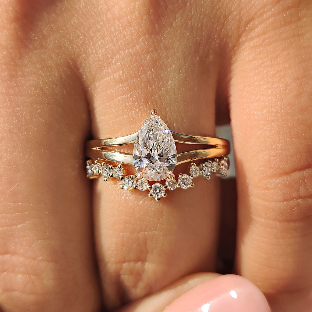 Hidden Halo Pear Shaped Ring with Curved Band