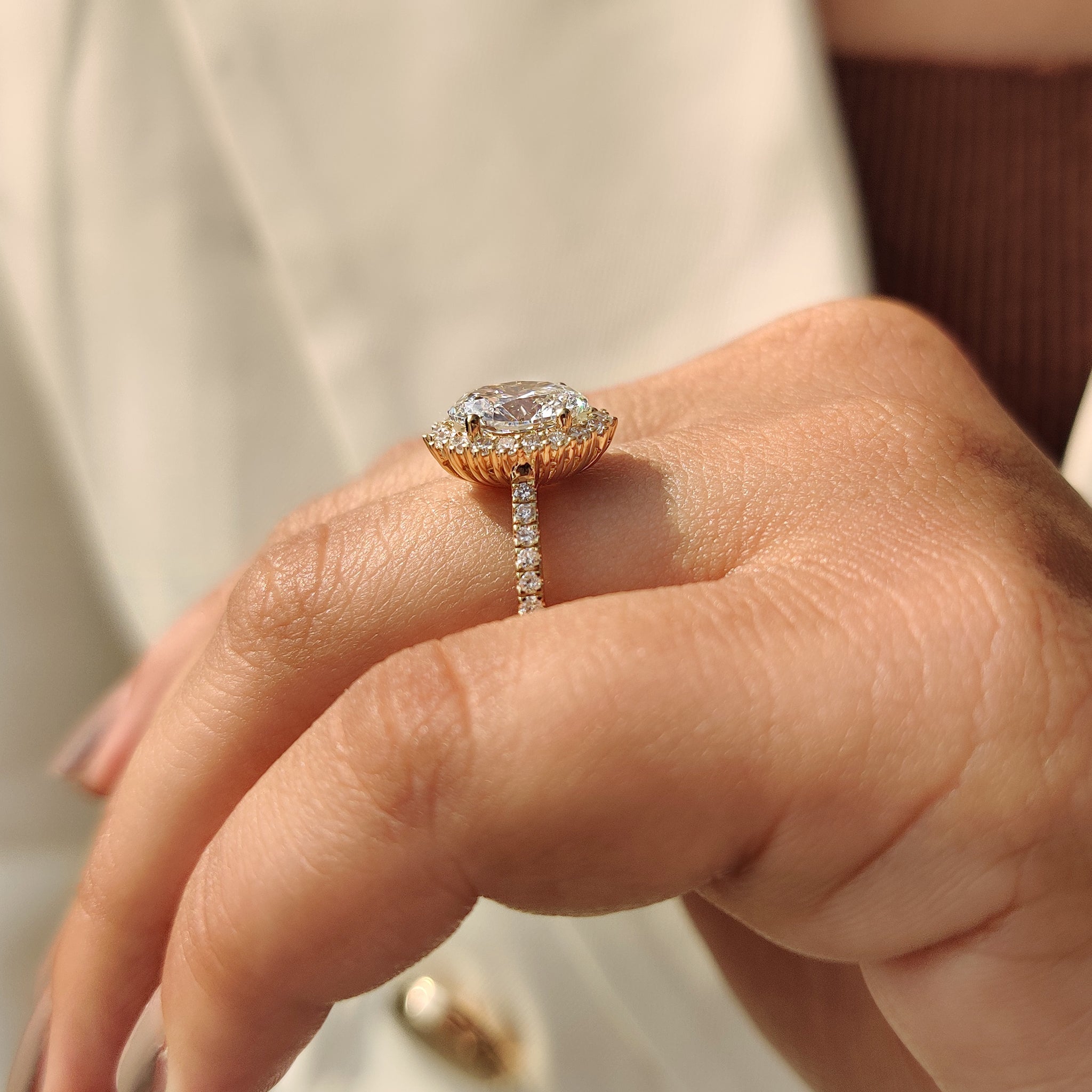 Oval Cut Diamond Engagement Ring In Halo And Pave Style