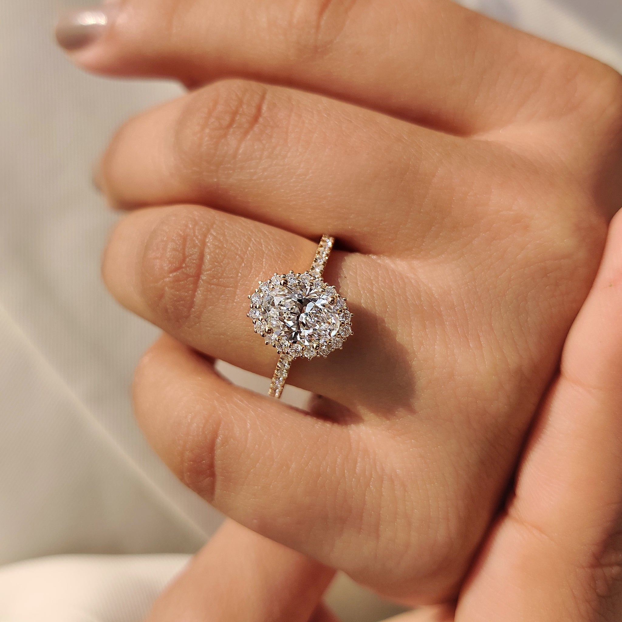Oval Cut Diamond Engagement Ring In Halo And Pave Style
