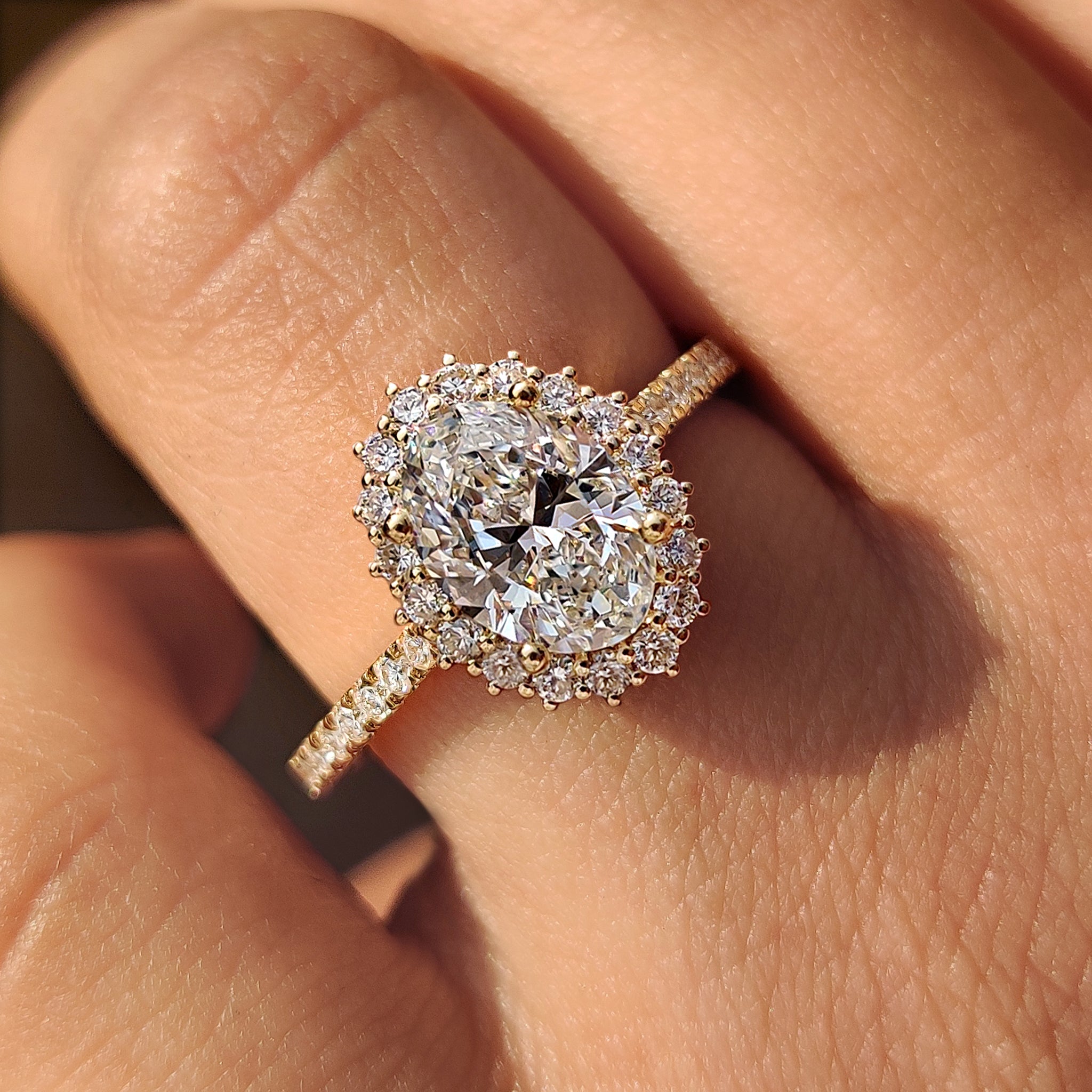 Oval Cut Diamond Engagement Ring In Halo And Pave Style