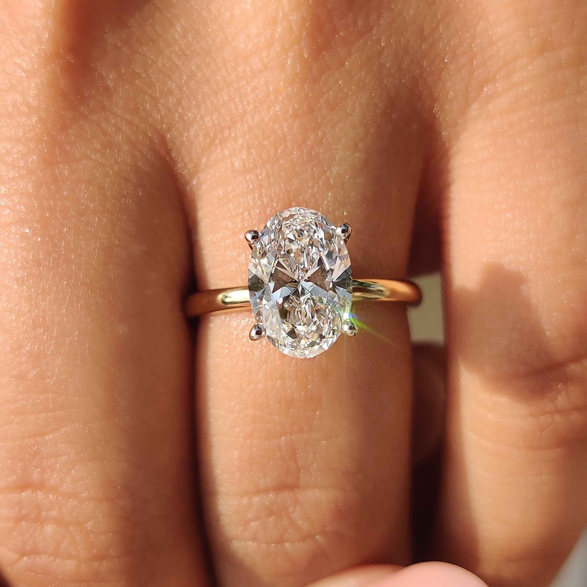 Two Tone Oval Cut Hidden Halo Engagement Ring