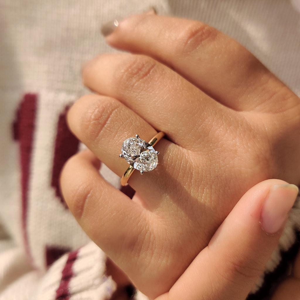 Two Tone Oval Cut Hidden Halo Engagement Ring