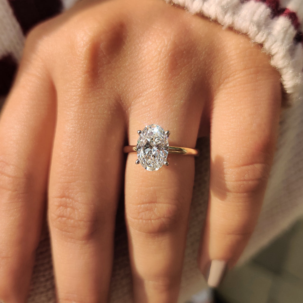 Two Tone Oval Cut Hidden Halo Engagement Ring