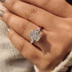 Two Tone Radiant Cut Diamond Ring With Pear Side Stones