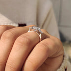 Two Tone Radiant Cut Diamond Ring With Pear Side Stones
