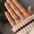 Two Tone Radiant Cut Diamond Ring With Pear Side Stones