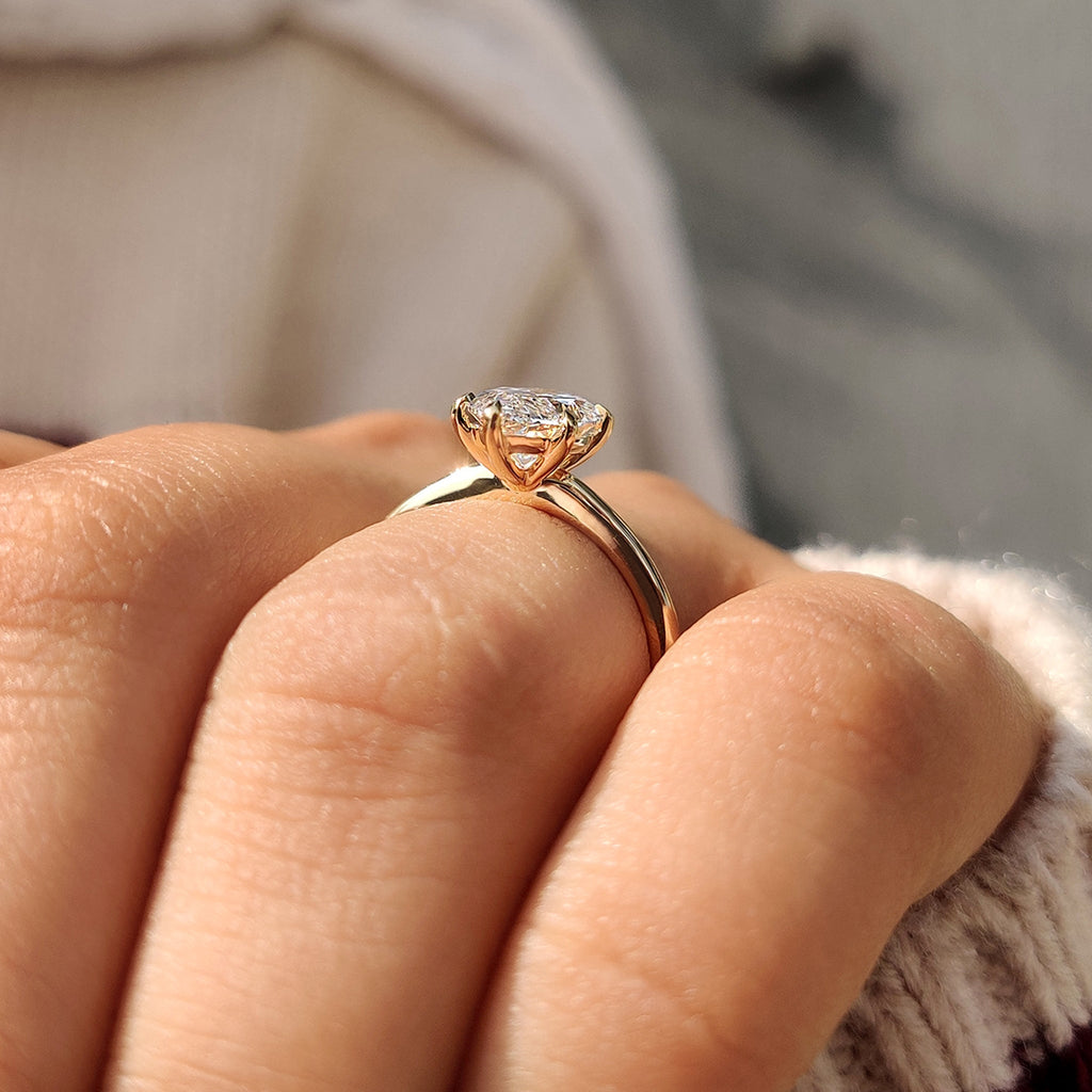 Solitaire Style Marquise Diamond Ring With Secure Claw Prong