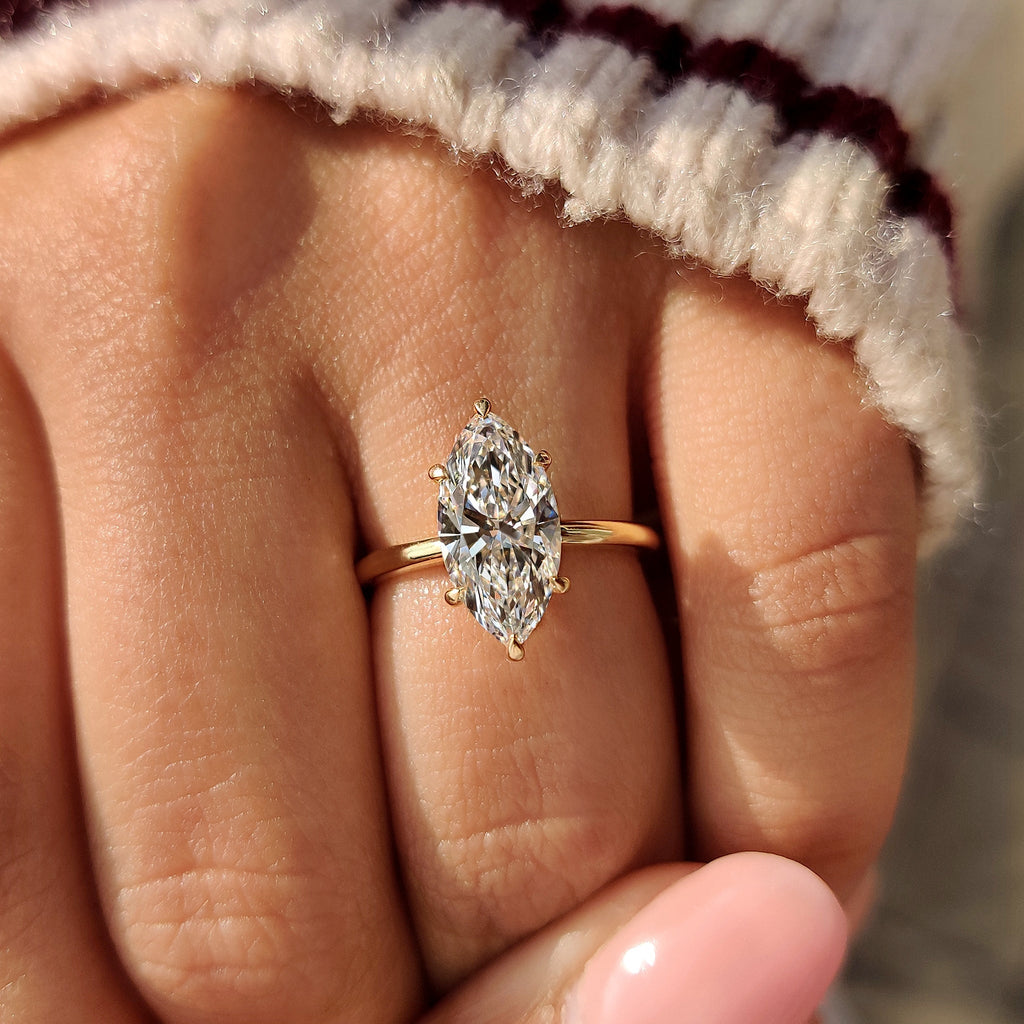 Solitaire Style Marquise Diamond Ring With Secure Claw Prong