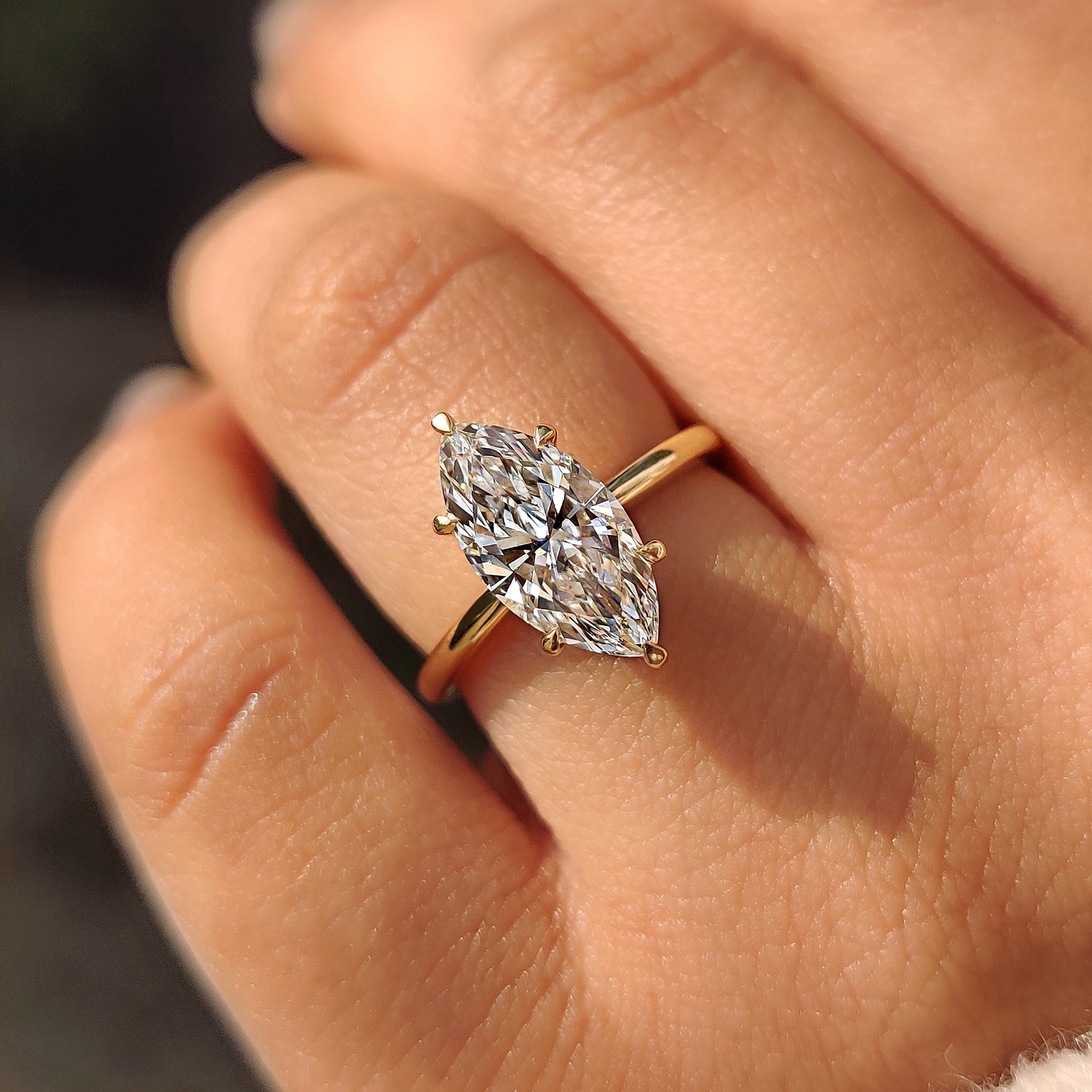 Solitaire Style Marquise Diamond Ring With Secure Claw Prong