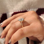 Emerald and Pear Cut Diamond Bezel Set Engagement Ring