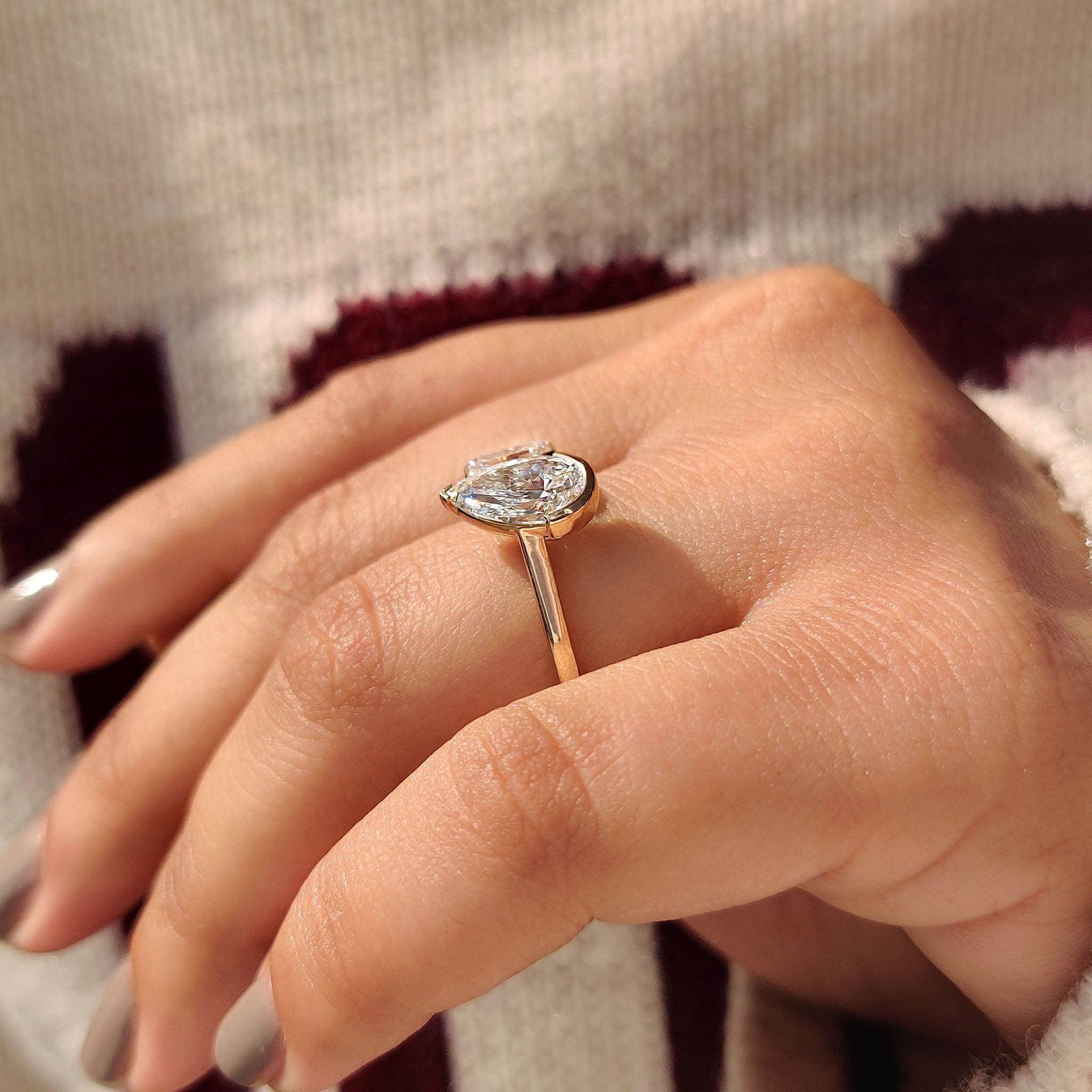 Emerald and Pear Cut Diamond Bezel Set Engagement Ring