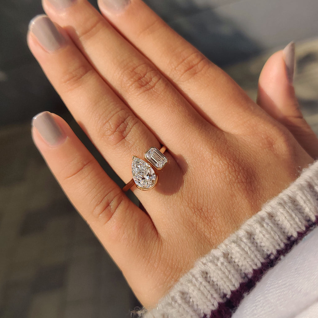 Emerald and Pear Cut Diamond Bezel Set Engagement Ring