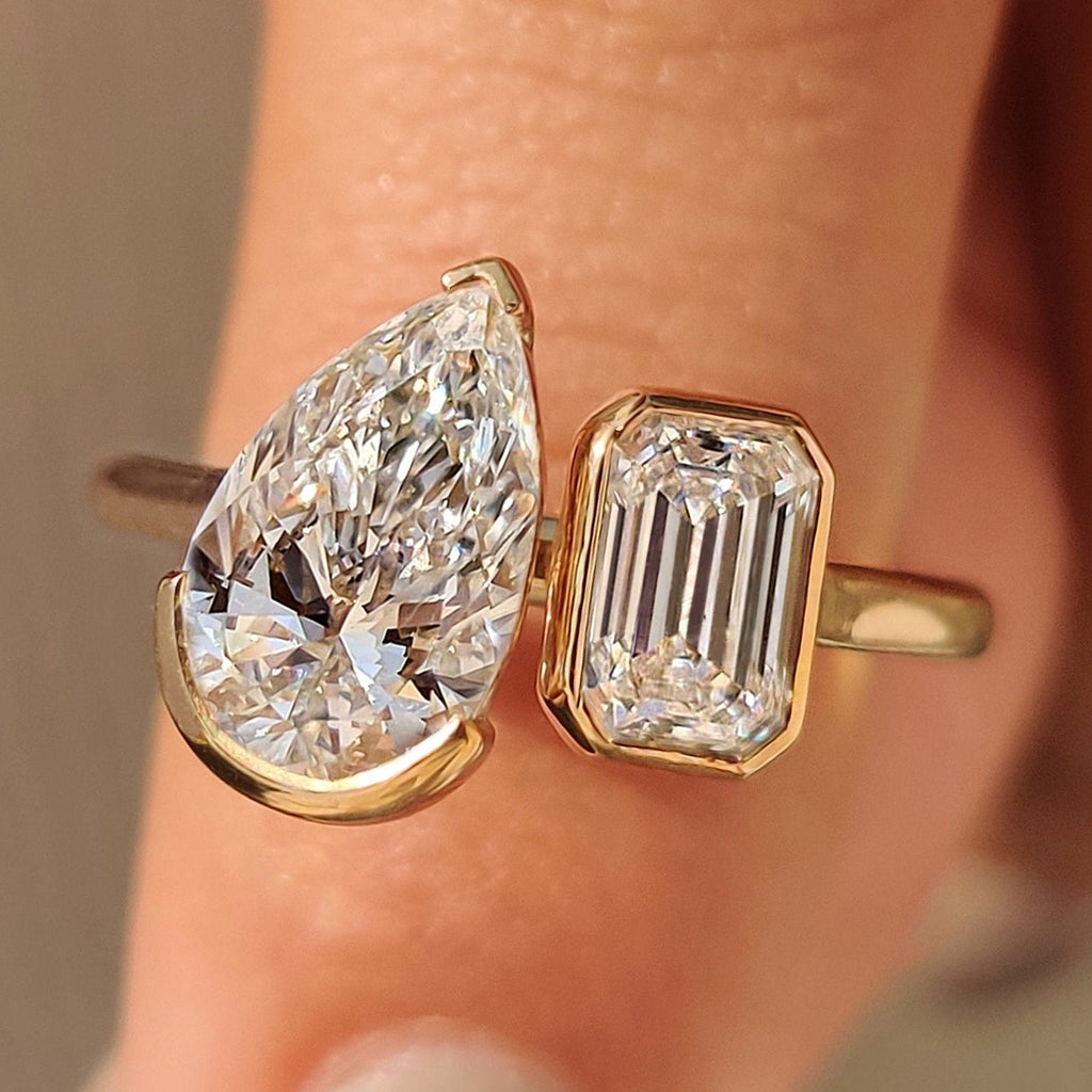 Emerald and Pear Cut Diamond Bezel Set Engagement Ring