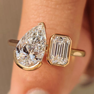 Emerald and Pear Cut Diamond Bezel Set Engagement Ring