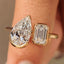 Emerald and Pear Cut Diamond Bezel Set Engagement Ring