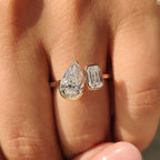 Emerald and Pear Cut Diamond Bezel Set Engagement Ring