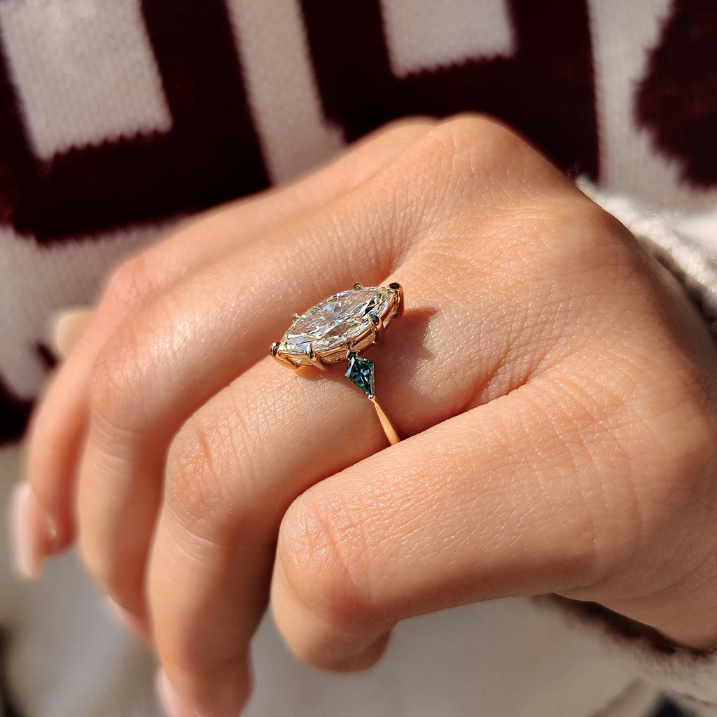 Marquise Cut Diamond Ring With Cyan Blue Kite Side Moissanite