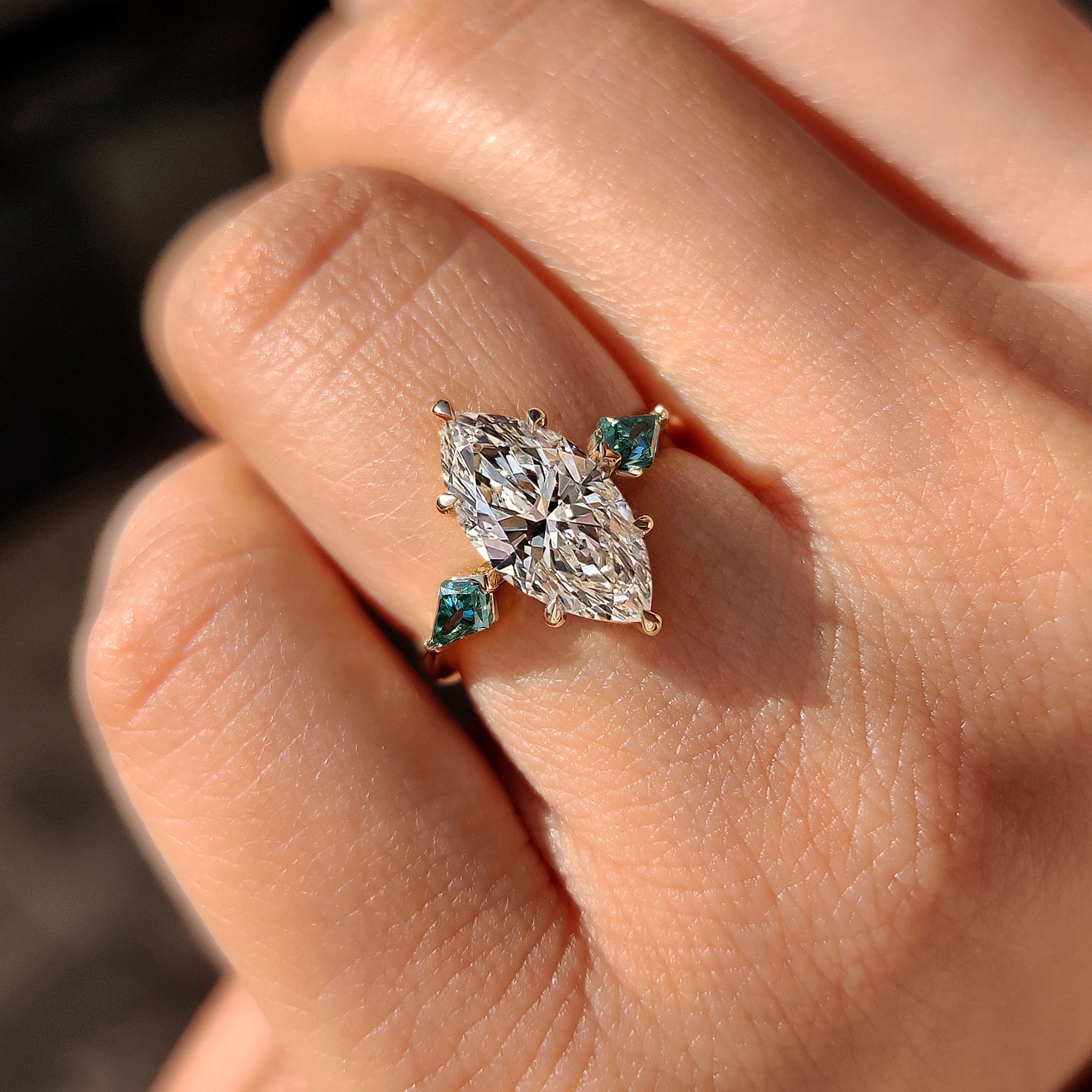 Marquise Cut Diamond Ring With Cyan Blue Kite Side Moissanite
