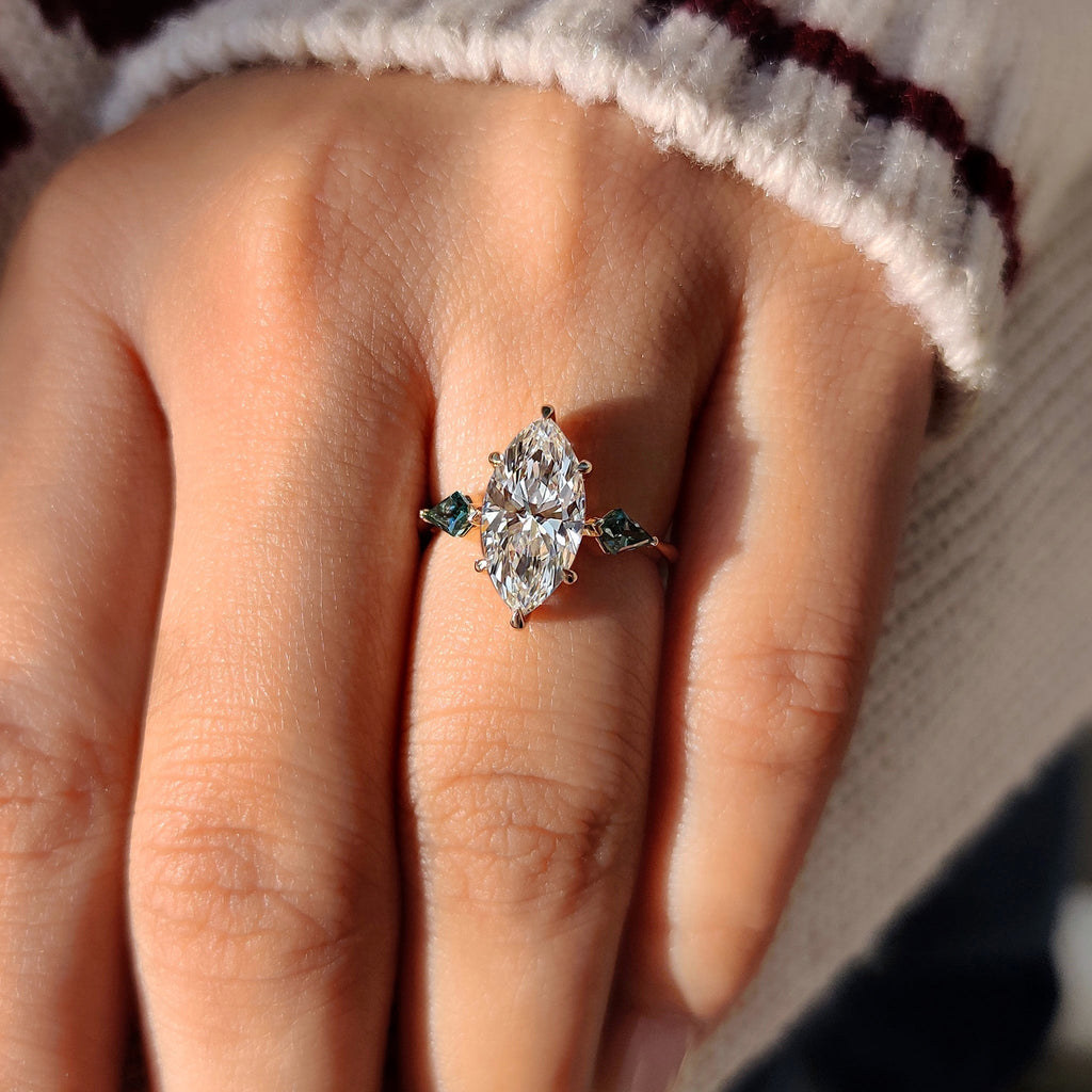 Marquise Cut Diamond Ring With Cyan Blue Kite Side Moissanite