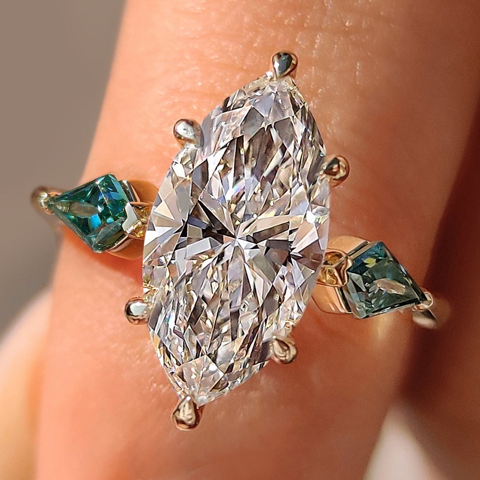 Marquise Cut Diamond Ring With Cyan Blue Kite Side Moissanite Main image