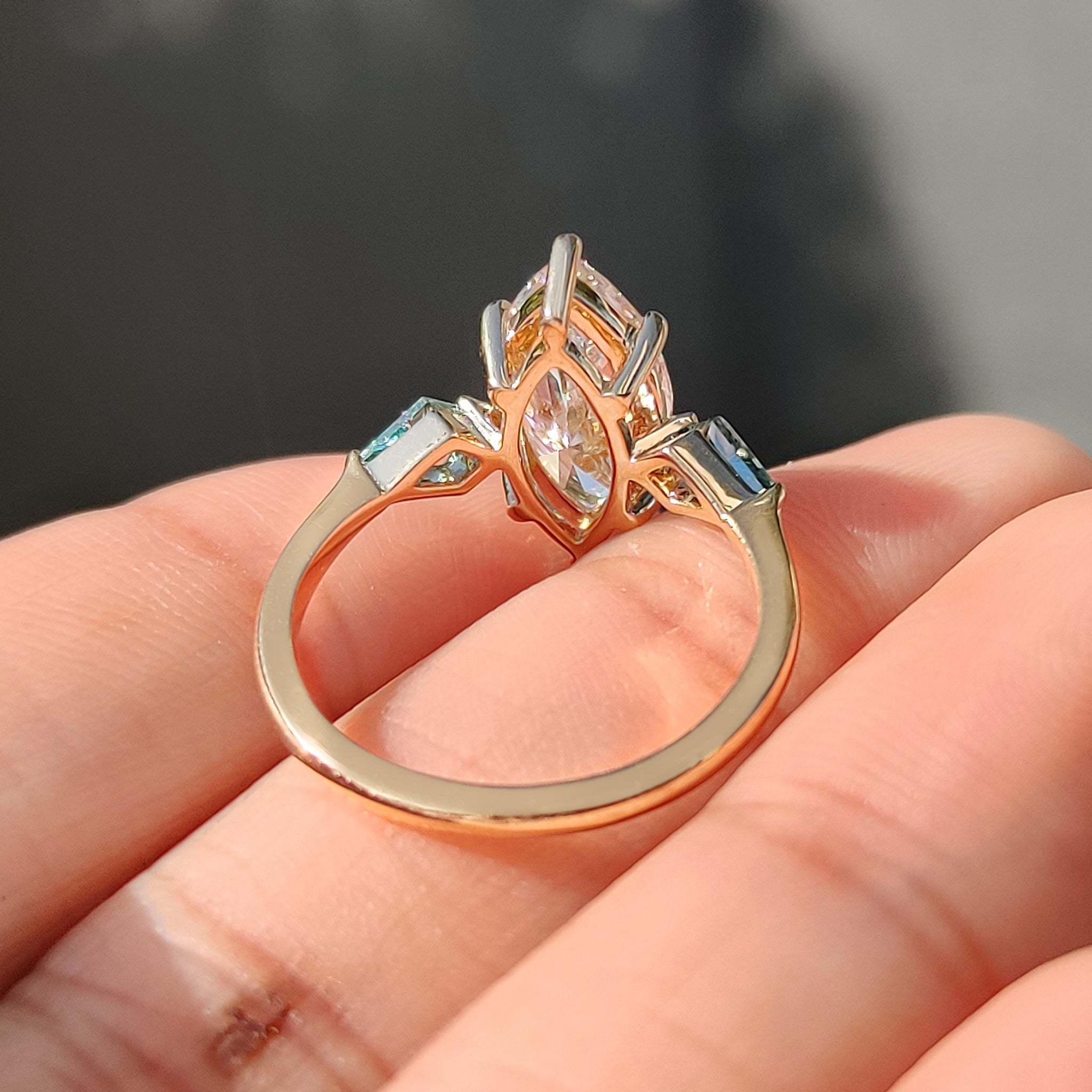 Marquise Cut Diamond Ring With Cyan Blue Kite Side Moissanite
