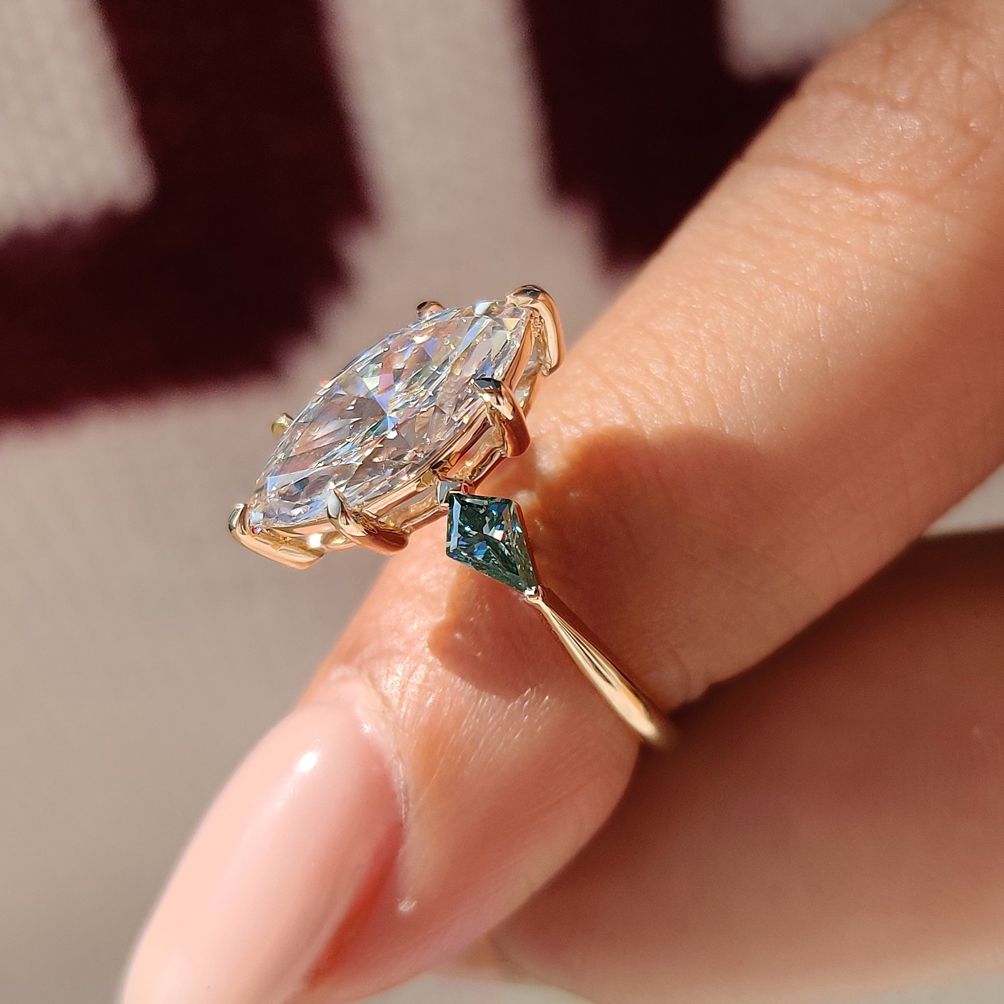 Marquise Cut Diamond Ring With Cyan Blue Kite Side Moissanite