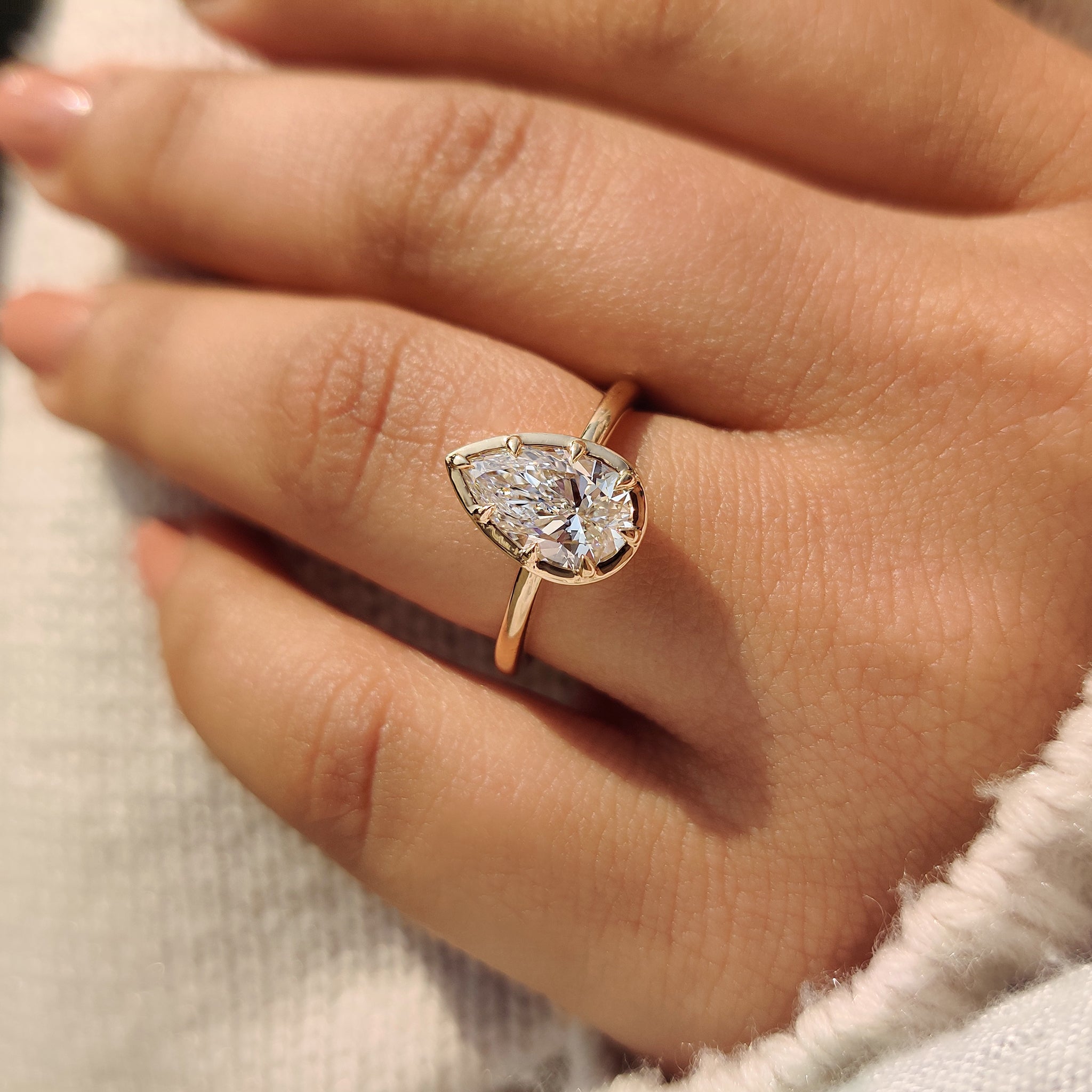 Pear Cut Diamond Ring in Bezel Type Prong Setting