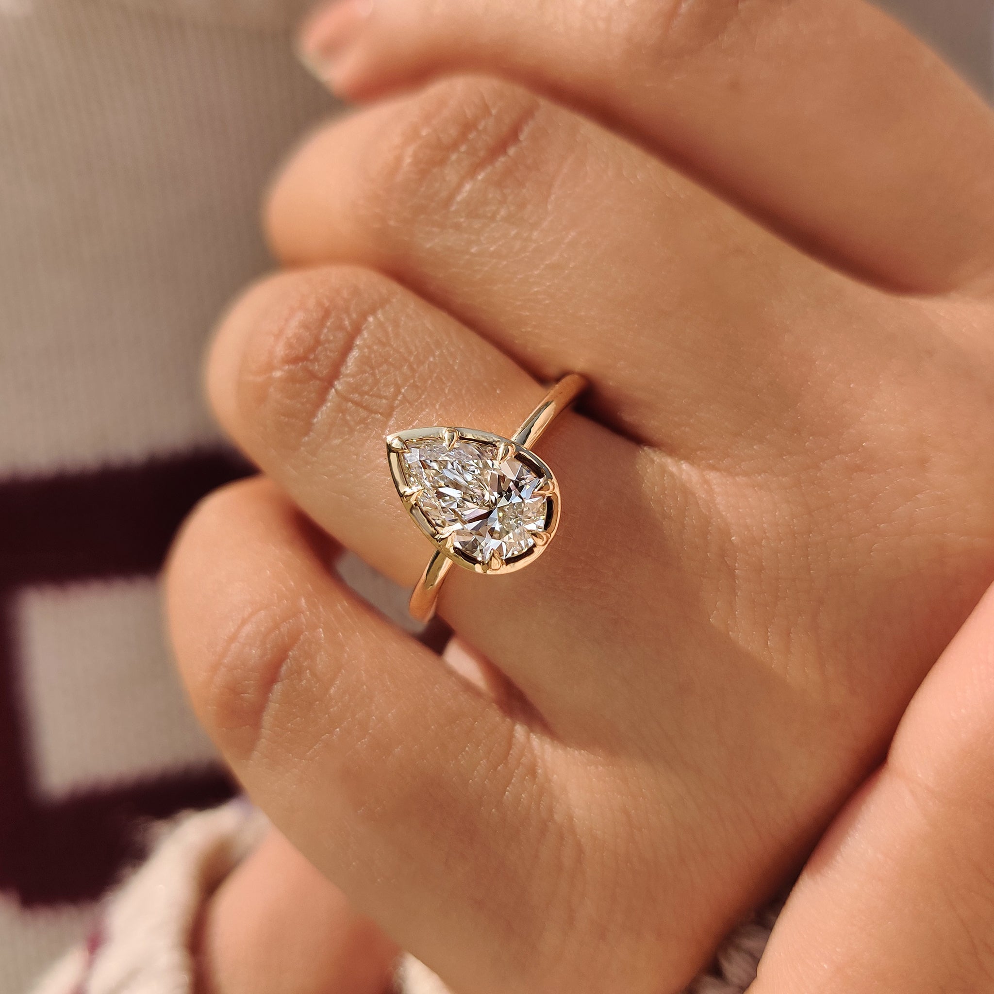 Pear Cut Diamond Ring in Bezel Type Prong Setting