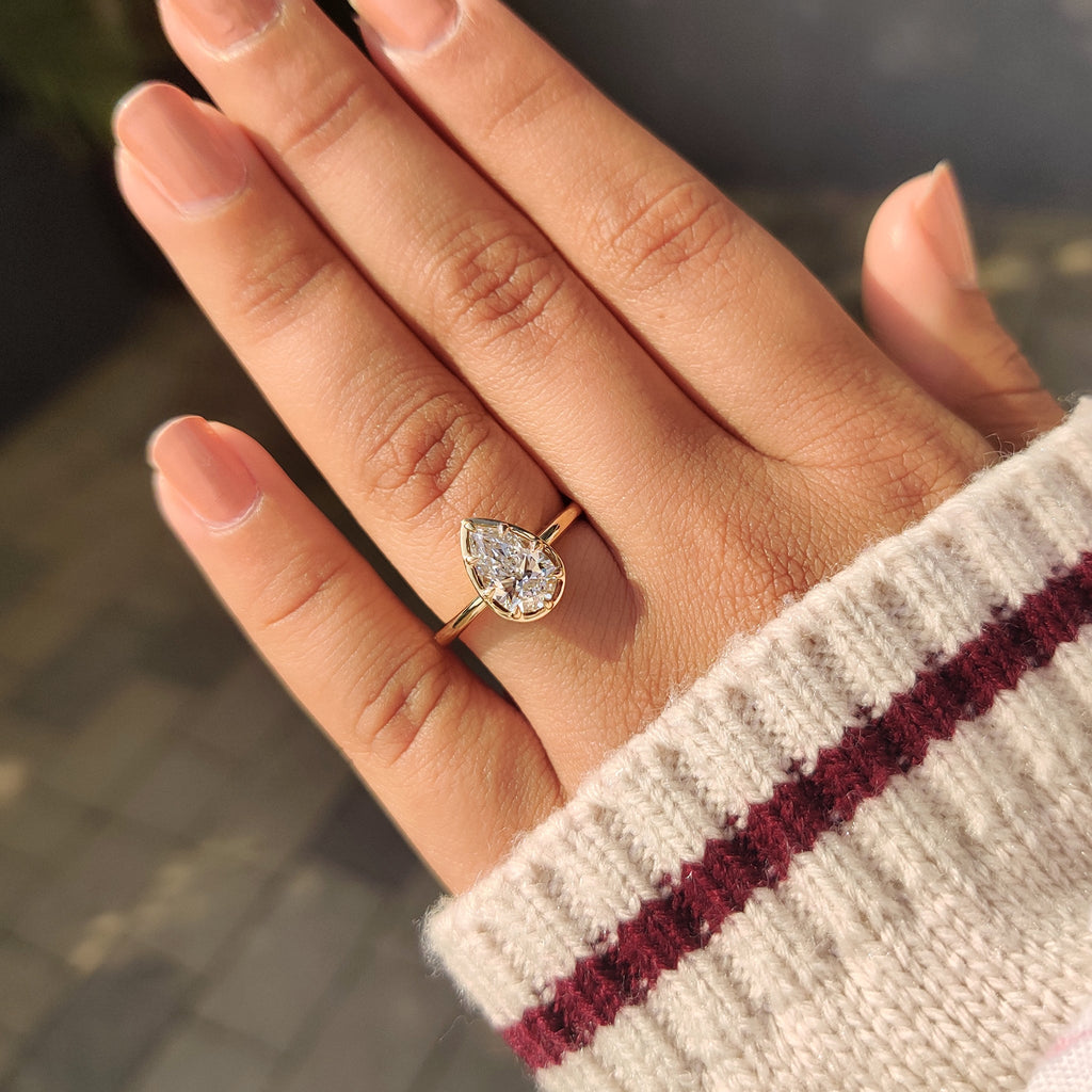 Pear Cut Diamond Ring in Bezel Type Prong Setting